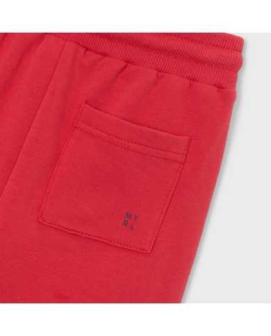 Bermuda de niño color tomate en tejido suave y cómodo, con cintura elástica, detalle del bolsillo